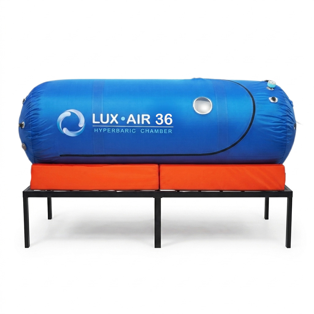 Blue Lux Air 36 soft hyperbaric chamber resting on an orange mattress and black metal stand
